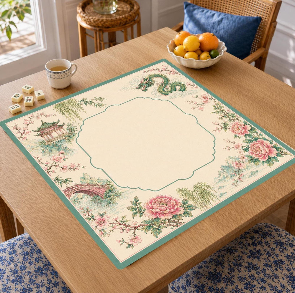 A jade dragon, garden pavilions and pink peonies frame an ornamental cream center on this chinoiserie Mahjong mat.