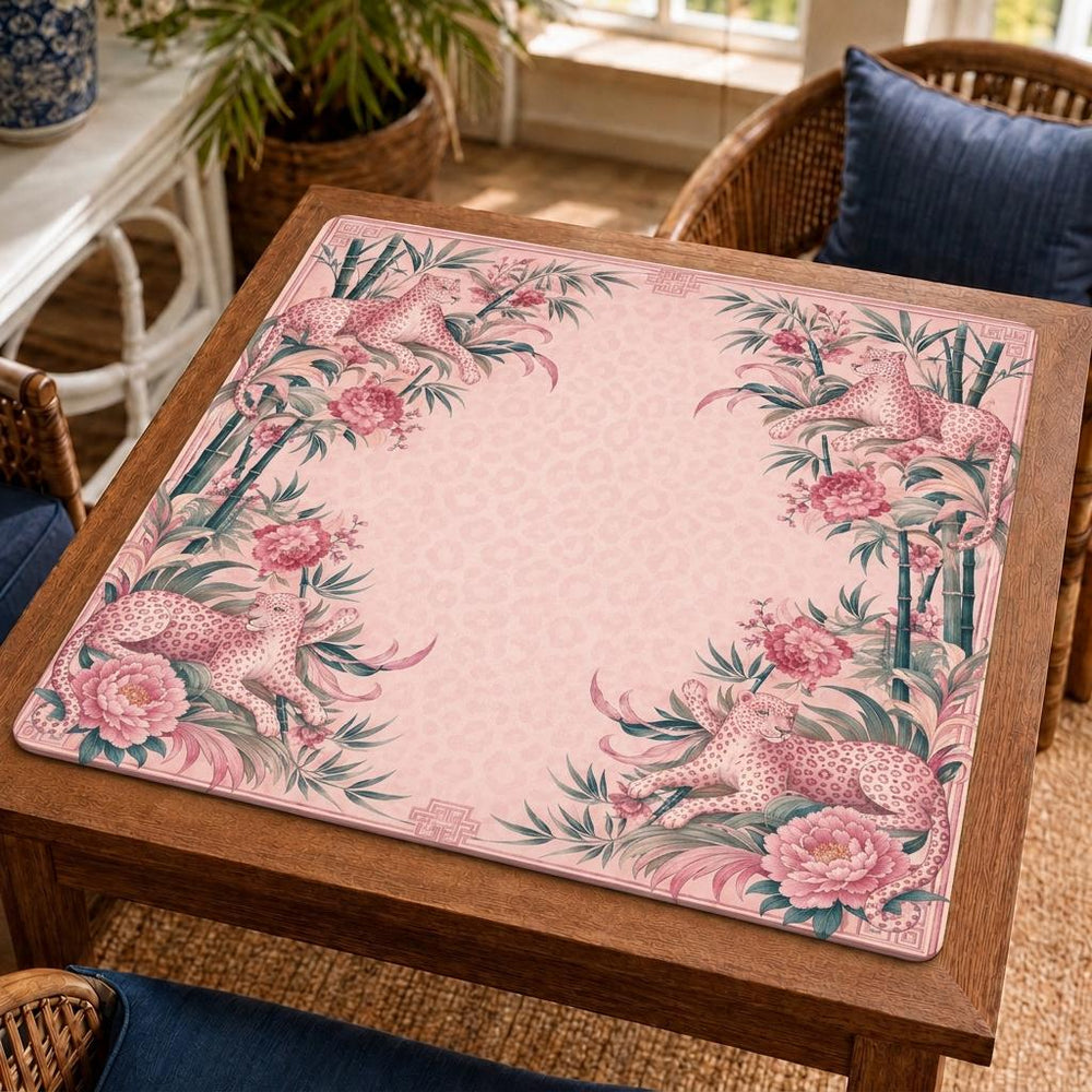 Leopards, bamboo and full peony blooms frame a softly patterned pink center on this chinoiserie Mahjong mat.