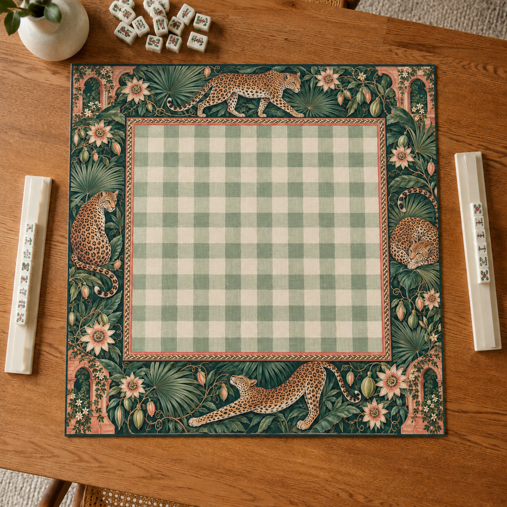 Leopard and sage gingham vegan leather Mahjong mat overhead on an oak table