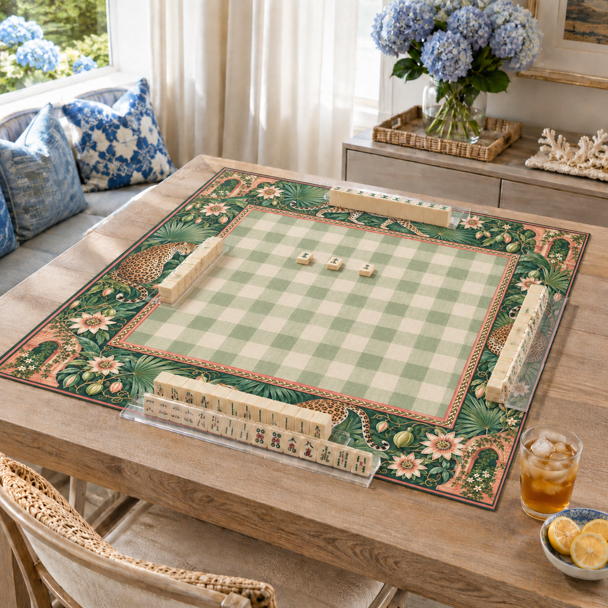 Leopard and sage gingham vegan leather Mahjong mat on a living room table
