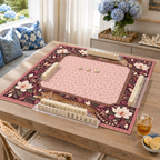 Burgundy vegan leather Mahjong mat with leopards and cream magnolias on a living room table