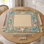 Coastal vegan leather Mahjong mat with seashells, blue crabs and coral on a bright kitchen table