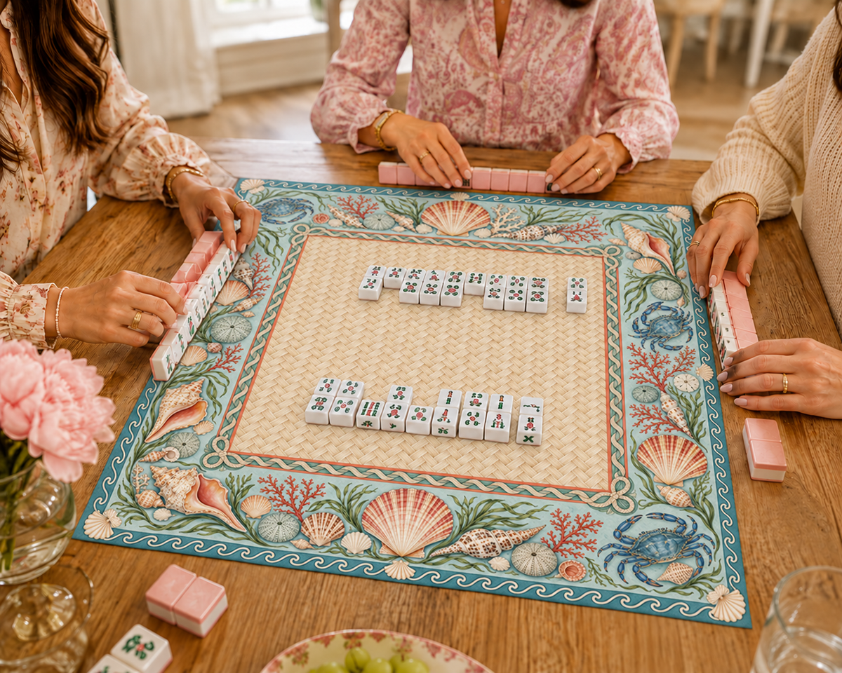 Coastal vegan leather Mahjong mat with seashells, blue crabs and coral with Mahjong tiles during play