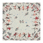 Cream Christmas Mahjong mat with vintage-style ice skaters, looping blue skating trails, snowflakes and festive greenery