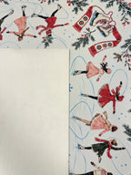 Cream suede backing beside the vintage ice skater Mahjong mat with red and pink skating outfits and blue trails