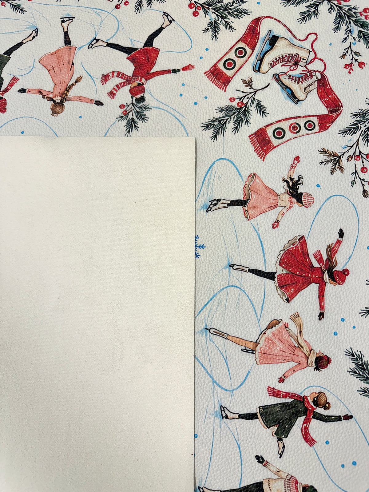 Cream suede backing beside the vintage ice skater Mahjong mat with red and pink skating outfits and blue trails