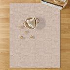 Easy-clean nursery play mat with boho geometric design
