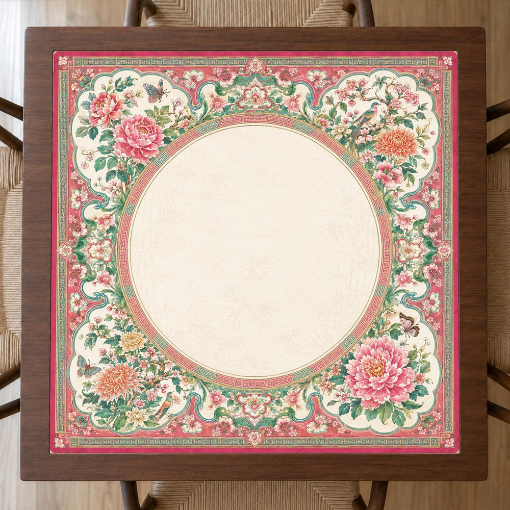 Pink flowers, green foliage and decorative medallions surround a large cream circle on this Rose Medallion-inspired Mahjong mat.
