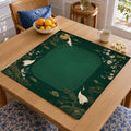 White cranes and delicate flowering branches border a deep emerald green center on this Japanese garden-inspired Mahjong mat.