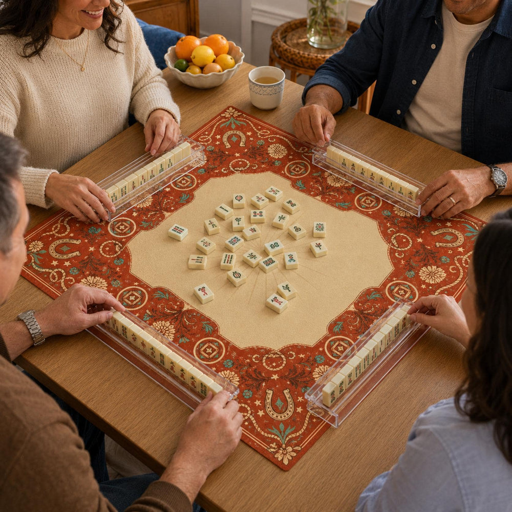 Rust-red bandana patterns, horseshoes and floral details surround the warm cream center of this Western Mahjong mat.