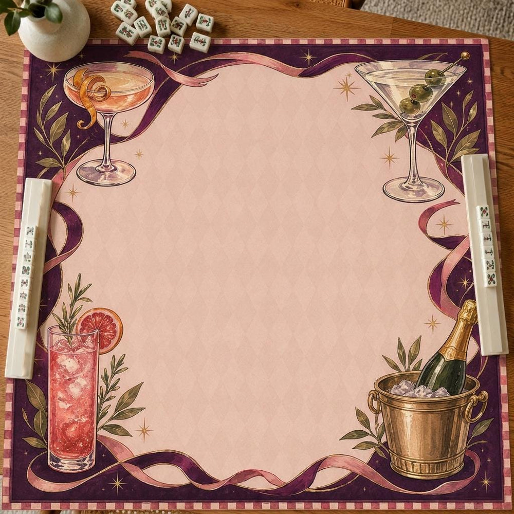 Cocktails, a champagne bucket and flowing ribbons decorate a blush-and-burgundy happy hour Mahjong mat.