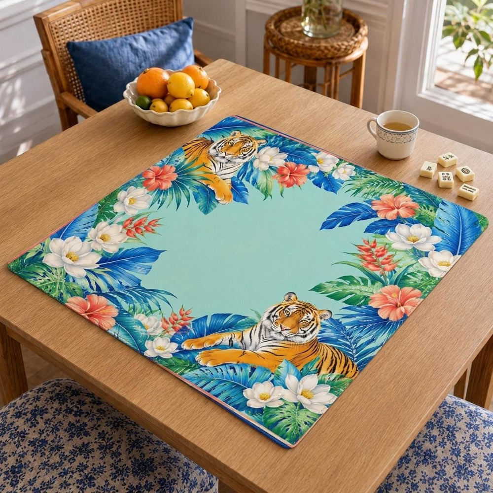 Tigers, large tropical leaves and bright flowers surround a turquoise playing area on this botanical Mahjong mat.