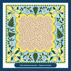 Full artwork preview of the Christmas Mahjong mat with cream patterned center, pale blue border, yellow striped bows and Christmas trees