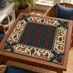 Christmas Mahjong mat with red-and-green tartan center, deer, holly, Christmas trees and dark green corner bows on a wooden game table